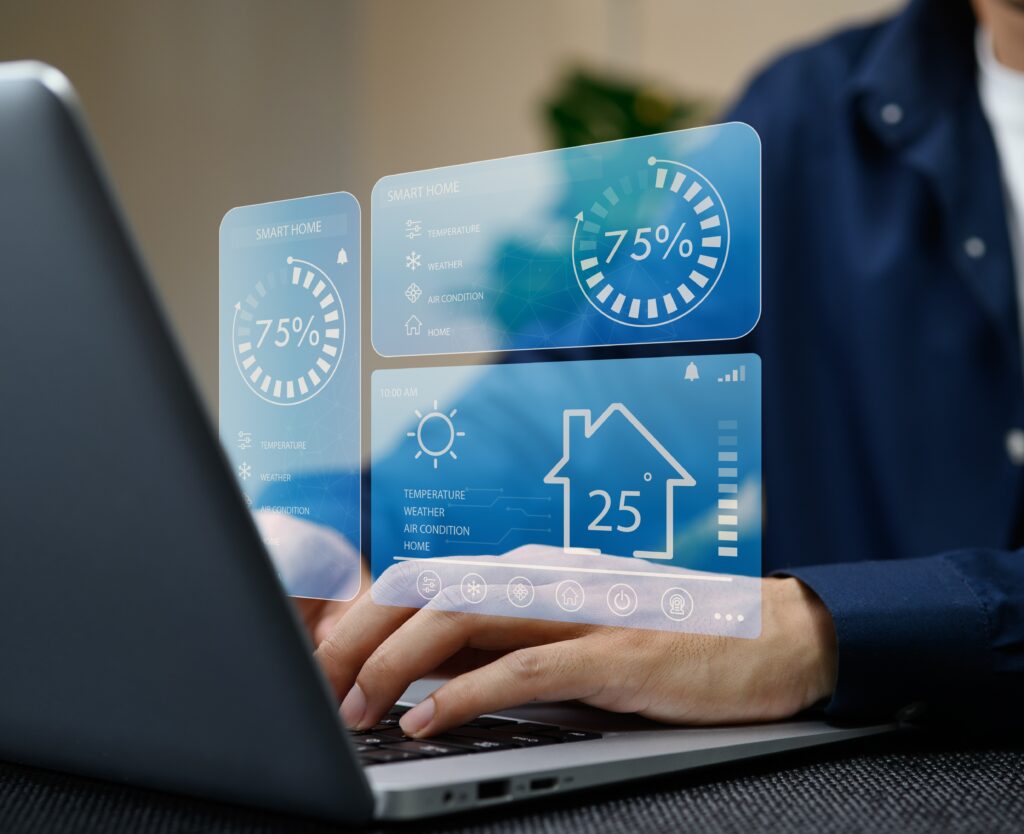Interface de gestion smart building affichant le suivi des consommations, de la température et des équipements énergétiques en temps réel sur un ordinateur portable pour le tertiaire - OCEA Smart Building