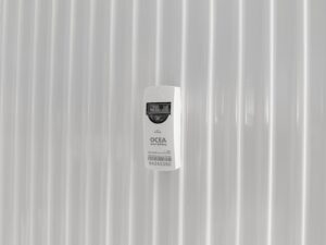 Répartiteur de frais de chauffage (RFC) fixé sur un radiateur, utilisé pour mesurer les consommations de chauffage individuel et garantir une répartition équitable des charges - OCEA Smart Building