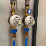 Compteurs d’eau individuels installés sur réseau en immeuble collectif, permettant la mesure, la télérelève et la répartition équitable des consommations - OCEA Smart Building